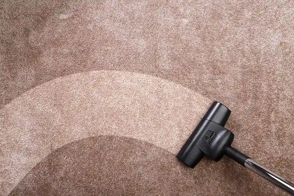 Stripe of clean carpet.