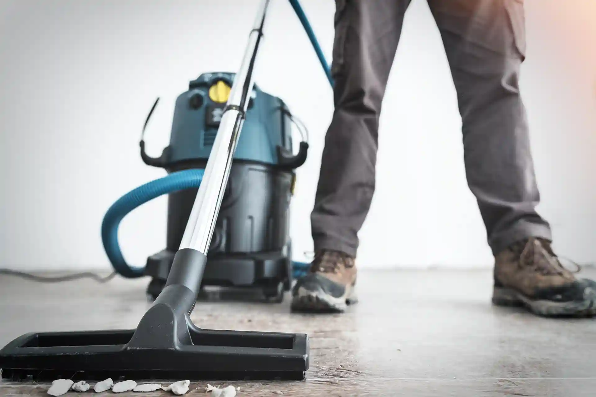 Vacuuming rocks and dirt.